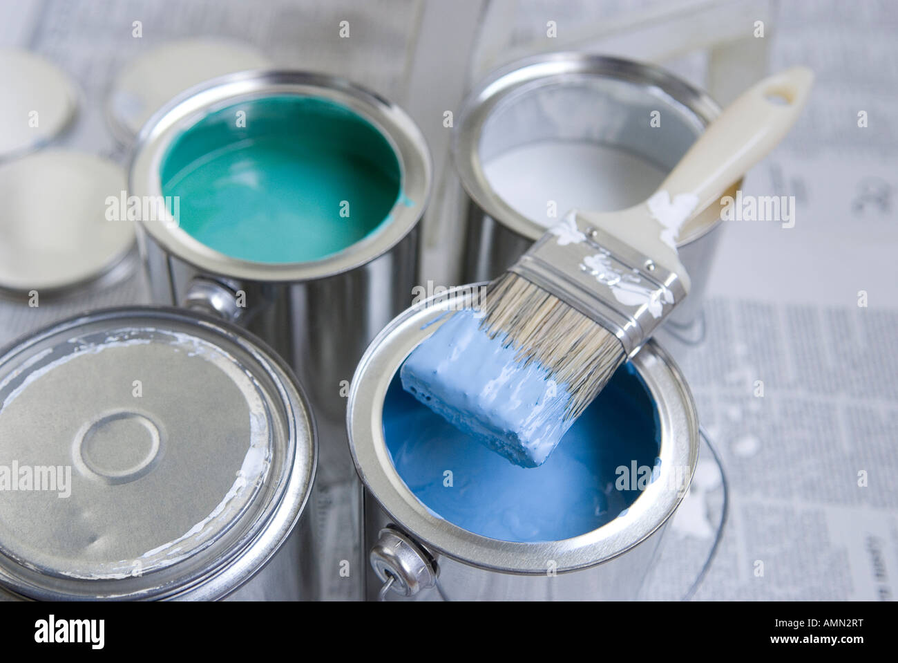 Paintbrush on paint can Stock Photo