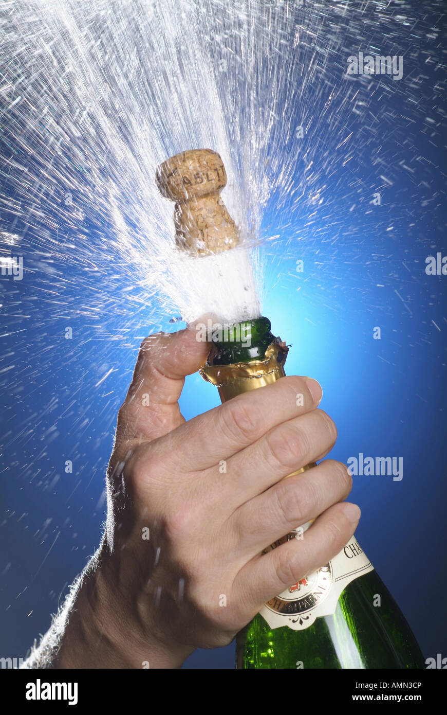 Champagne bottle being opened Stock Photo Alamy