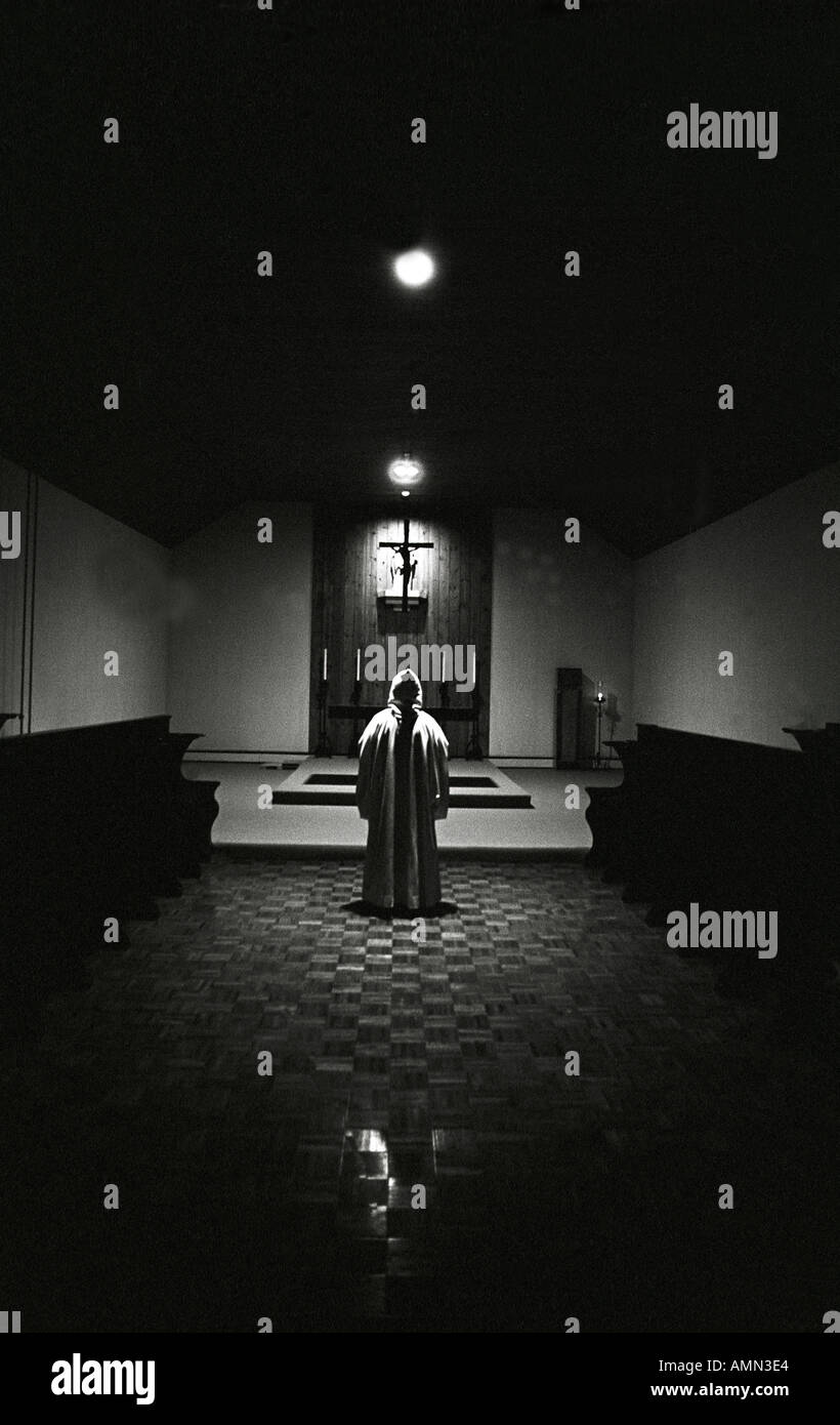 Cistercian Monk attending early morning prayer service at the Holy Cross Abbey in Berryville Virginia Stock Photo