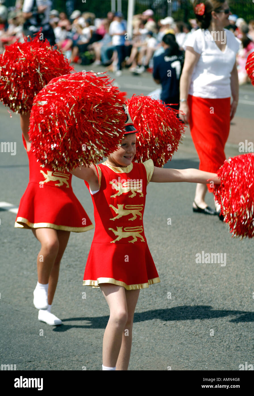 Young girl with marching band and Pom Poms Stock Photo - Alamy