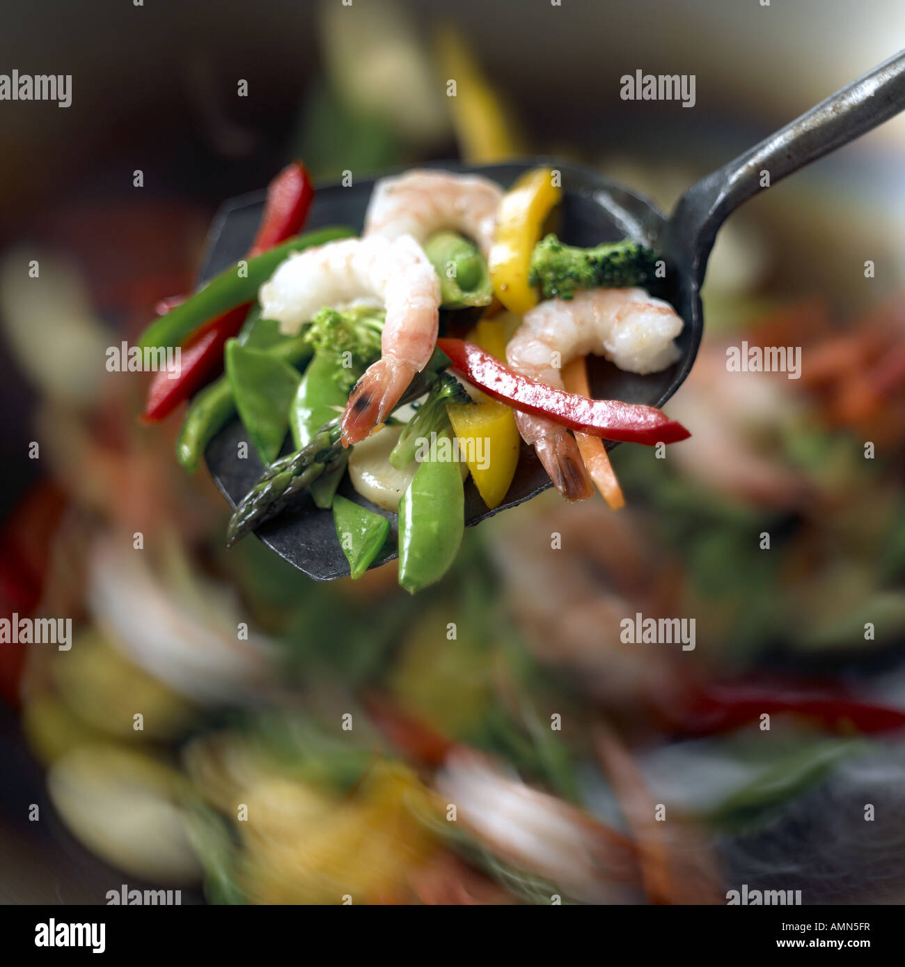 Prawn stir fry in wok Stock Photo - Alamy