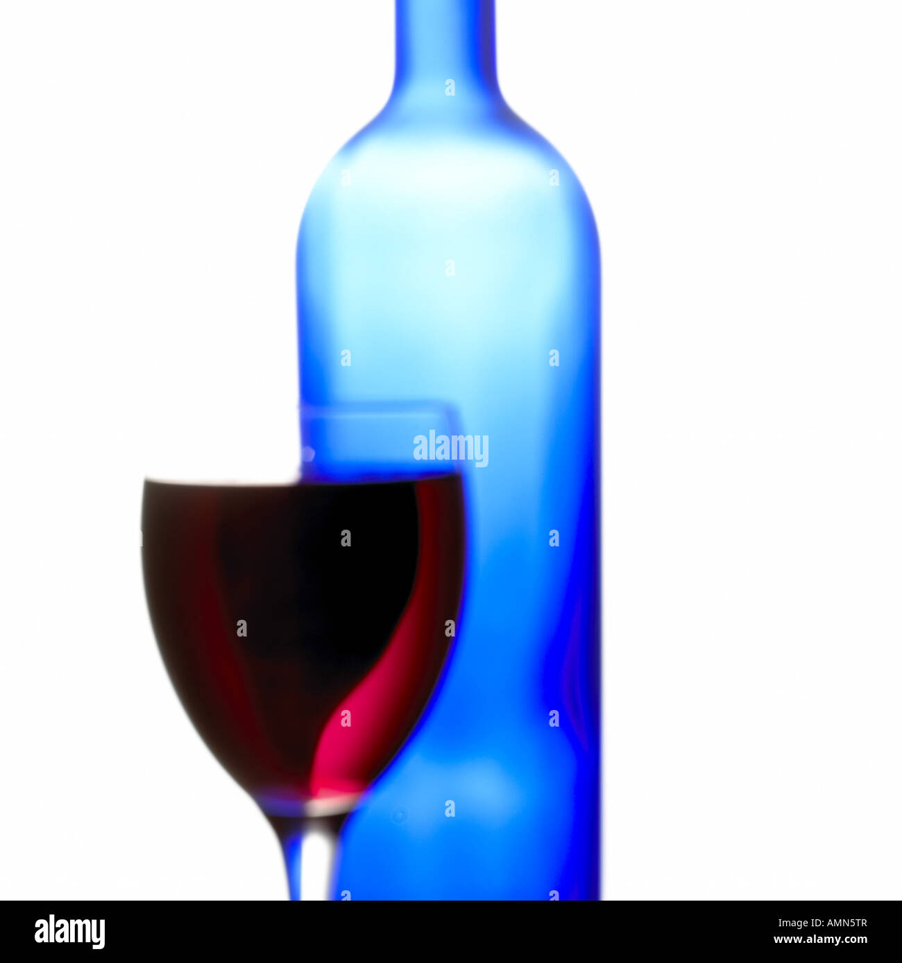 Red wine and blue bottle Stock Photo Alamy