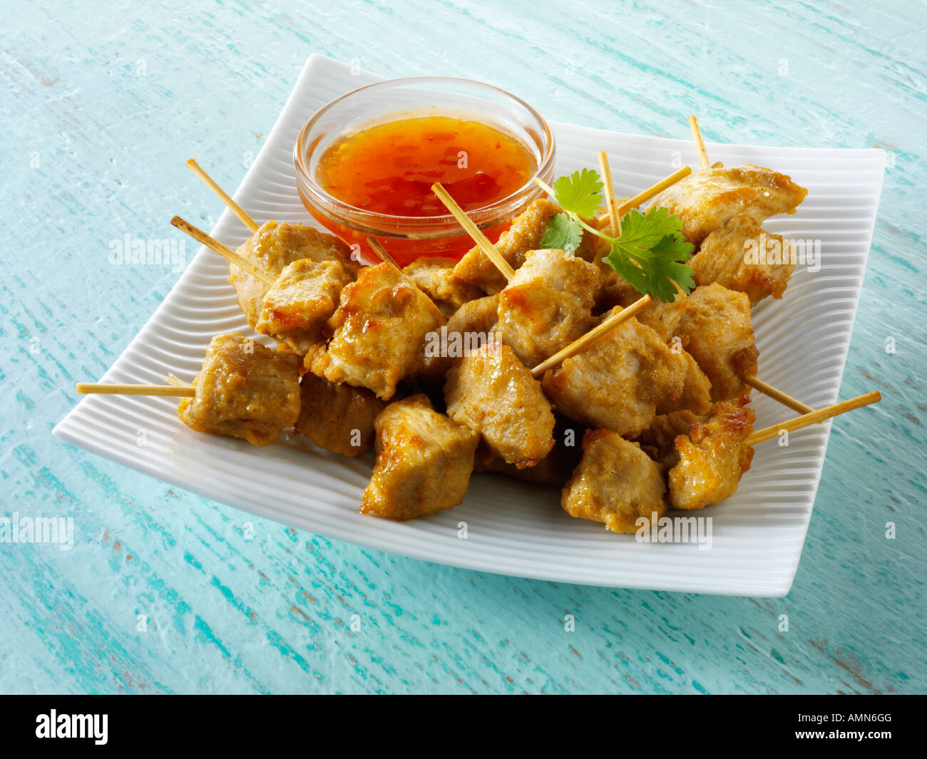 Chicken satay with dipping sauce Stock Photo Alamy
