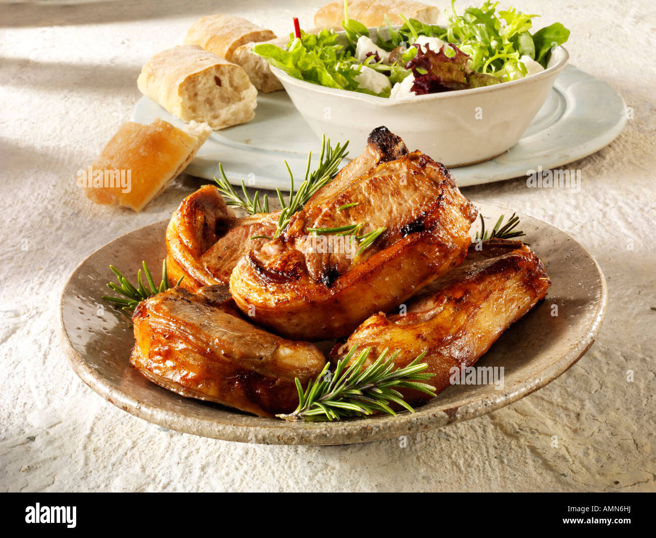 Grilled of griddles lamb steaks with rosemary, ready to eat Stock Photo