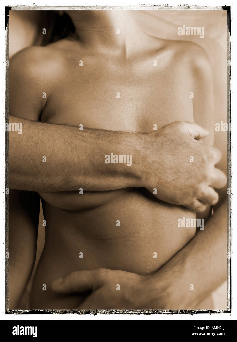 Naked couple hugging. Man's arm hiding women's breast. Romantic sexual  Stock Photo - Alamy