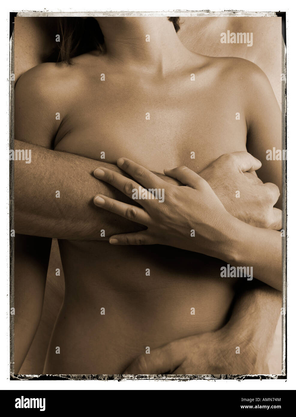Naked couple hugging. Man's arm hiding women's breast. Romantic sexual  Stock Photo - Alamy