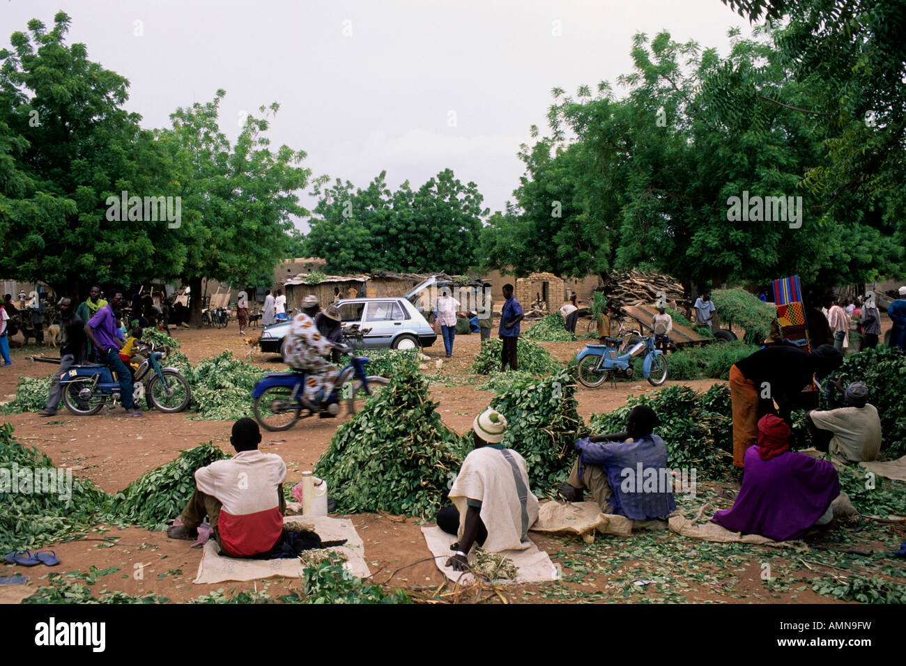The market of San with traders seated on the ground Stock Photo