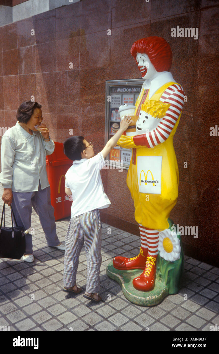 Little boy with Ronald McDonald at McDonald s restaurant in Beijing in Hebei Province People s Republic of China Stock Photo