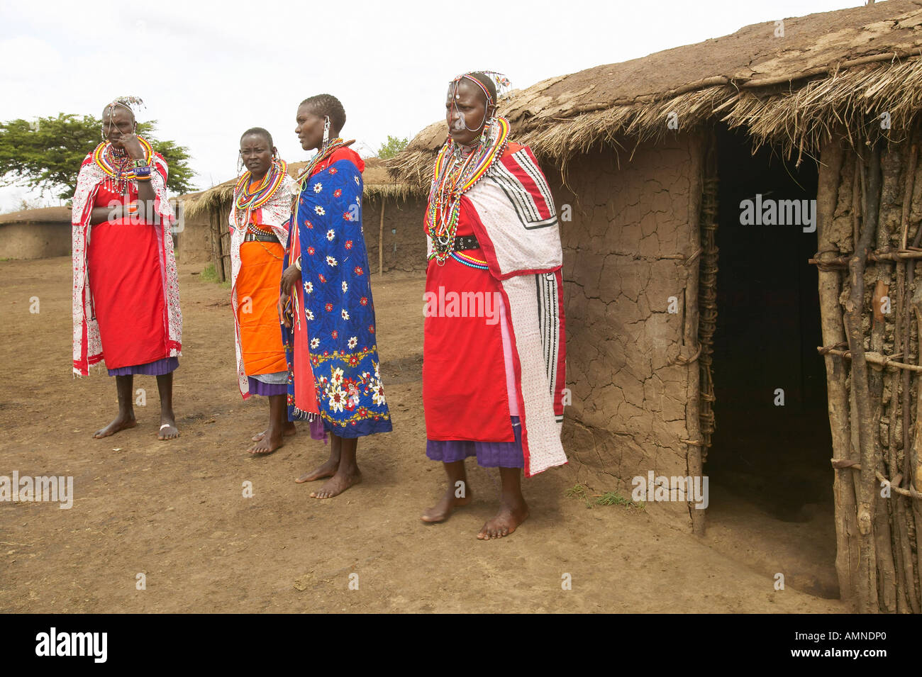 Masai females in robes in village near Tsavo National Park Kenya Africa Stock Photo