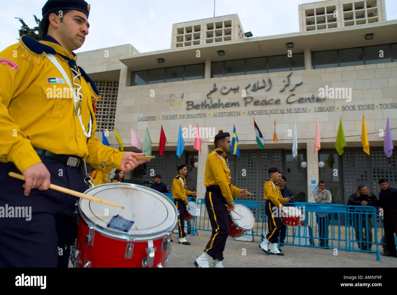 Palestinian Authority Bethlehem Manger Square close up of a scout drummer marching with Bethlehem Peace Center in bkgd Stock Photo