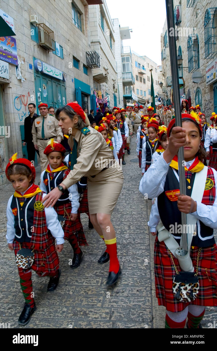Palestinian Authority Bethlehem Manger Square scouts band of young girls marching through the streets  Stock Photo