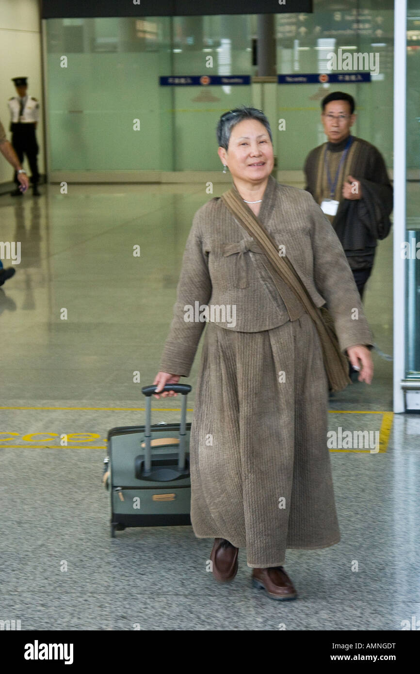 Middle Aged Korean Woman Arriving in Hong Kong International Airport ...