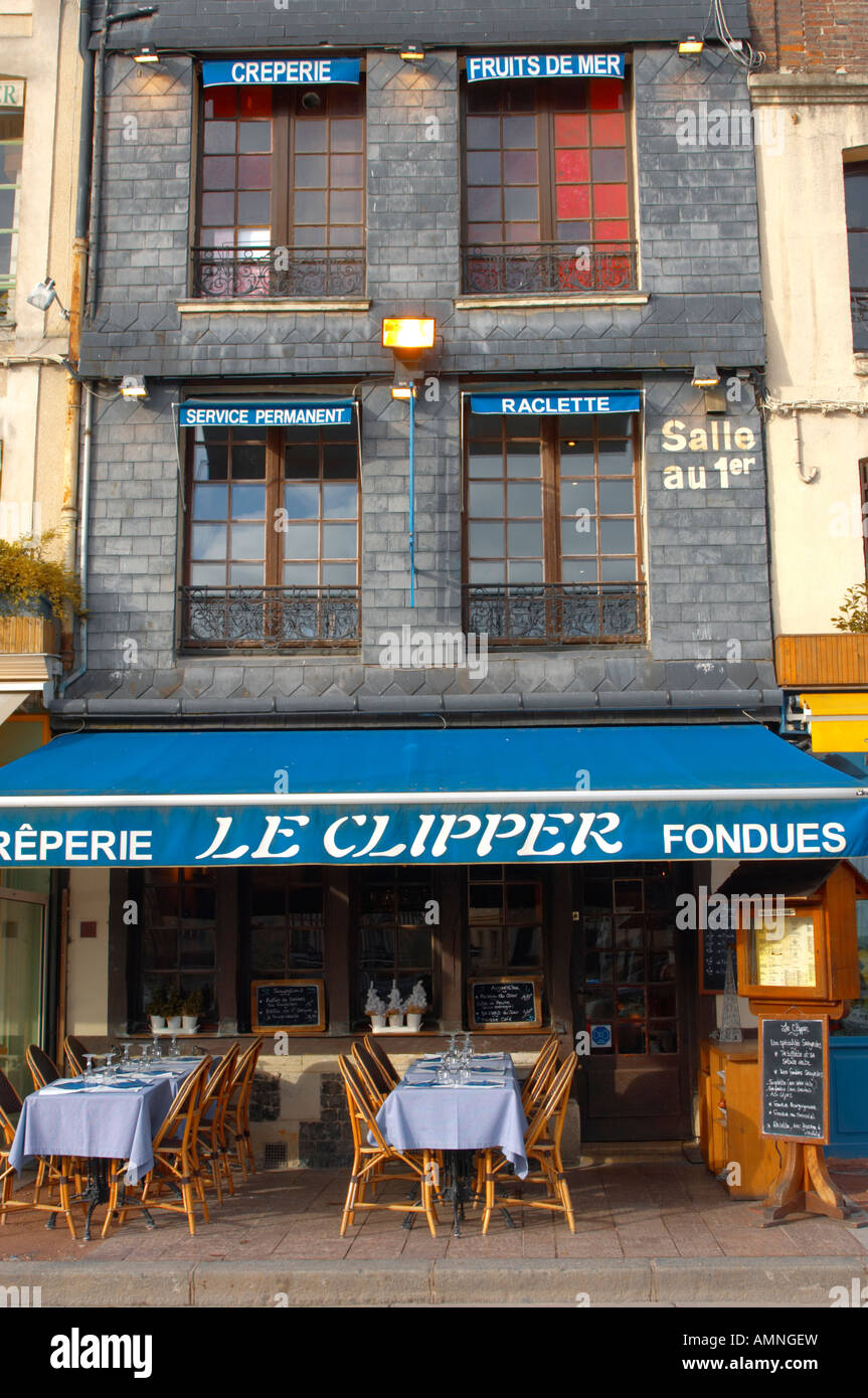 Honfleur Normandy France. Traditional French harbour side restaurant, bistro, cafe & shops. The clipper. Stock Photo