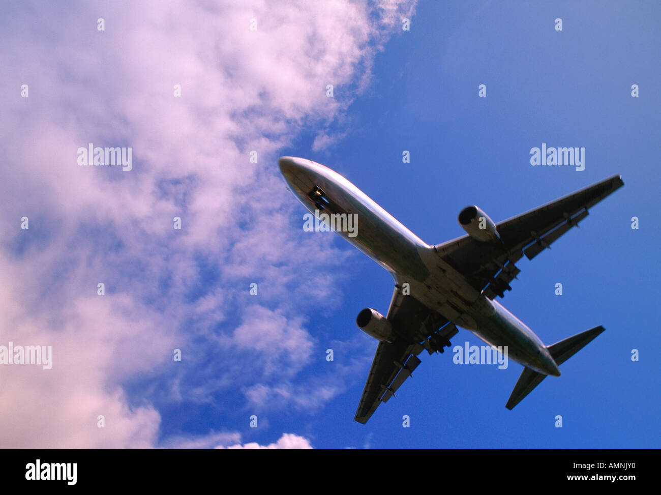 Airplane in Flight, Calgary, Alberta, Canada Stock Photo