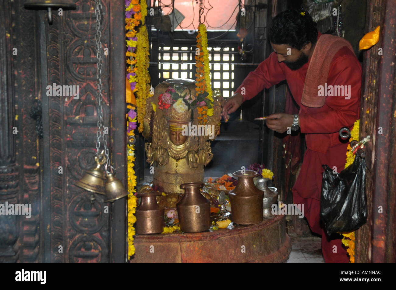 Braman in a religious ceremony at a Shiva Lingam Kumbeshwar Temple Patan Kathmandu Nepal Stock Photo