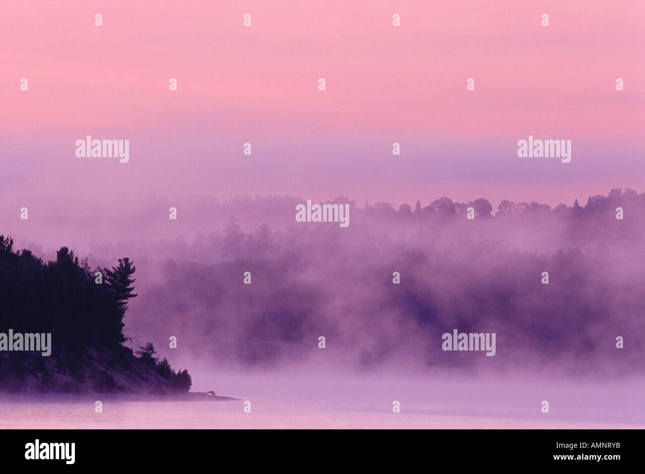 Fog At Dawn, Lake Baskatong, Quebec, Canada Stock Photo