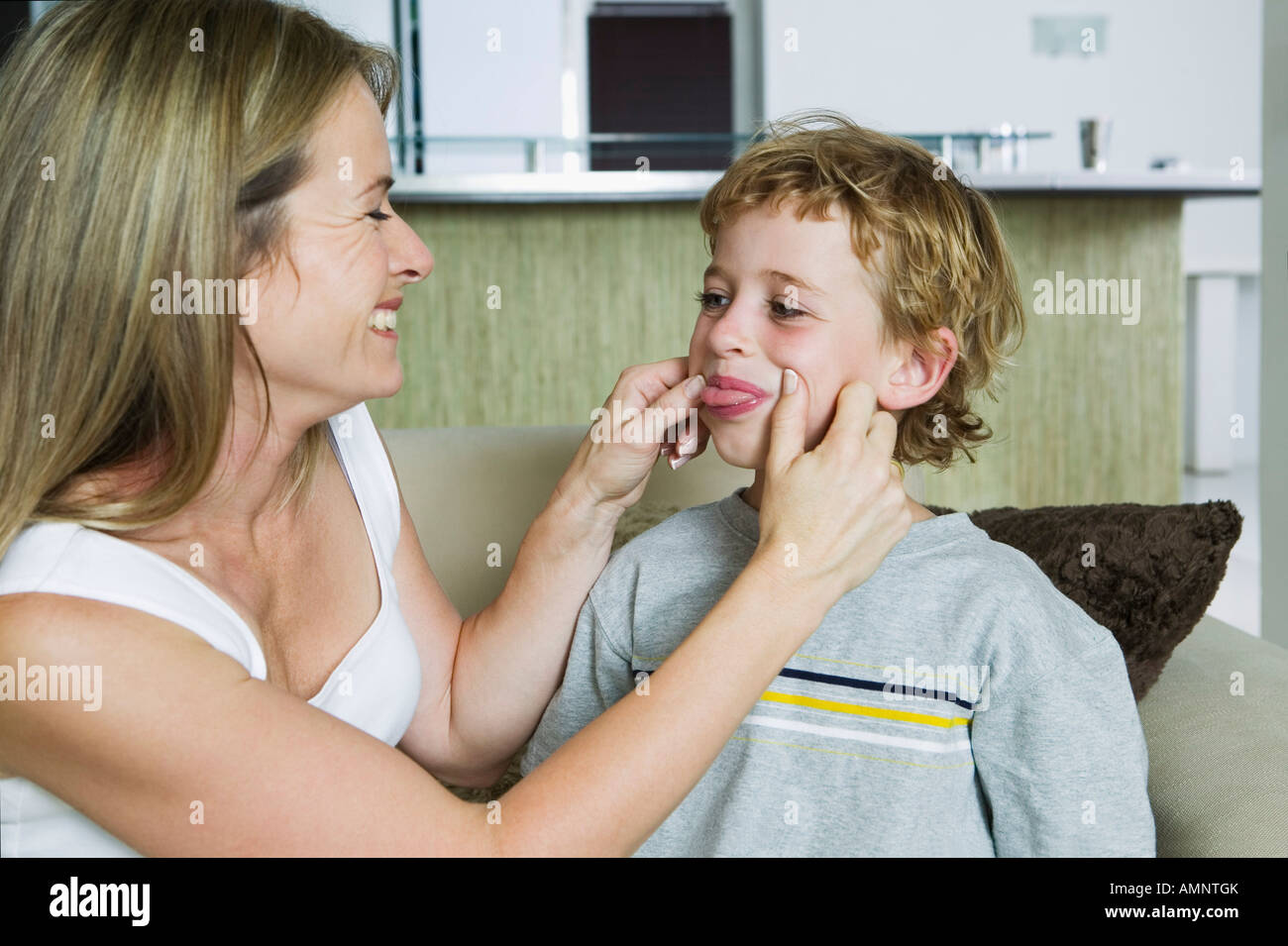 Pinching Cheek Hi Res Stock Photography And Images Alamy