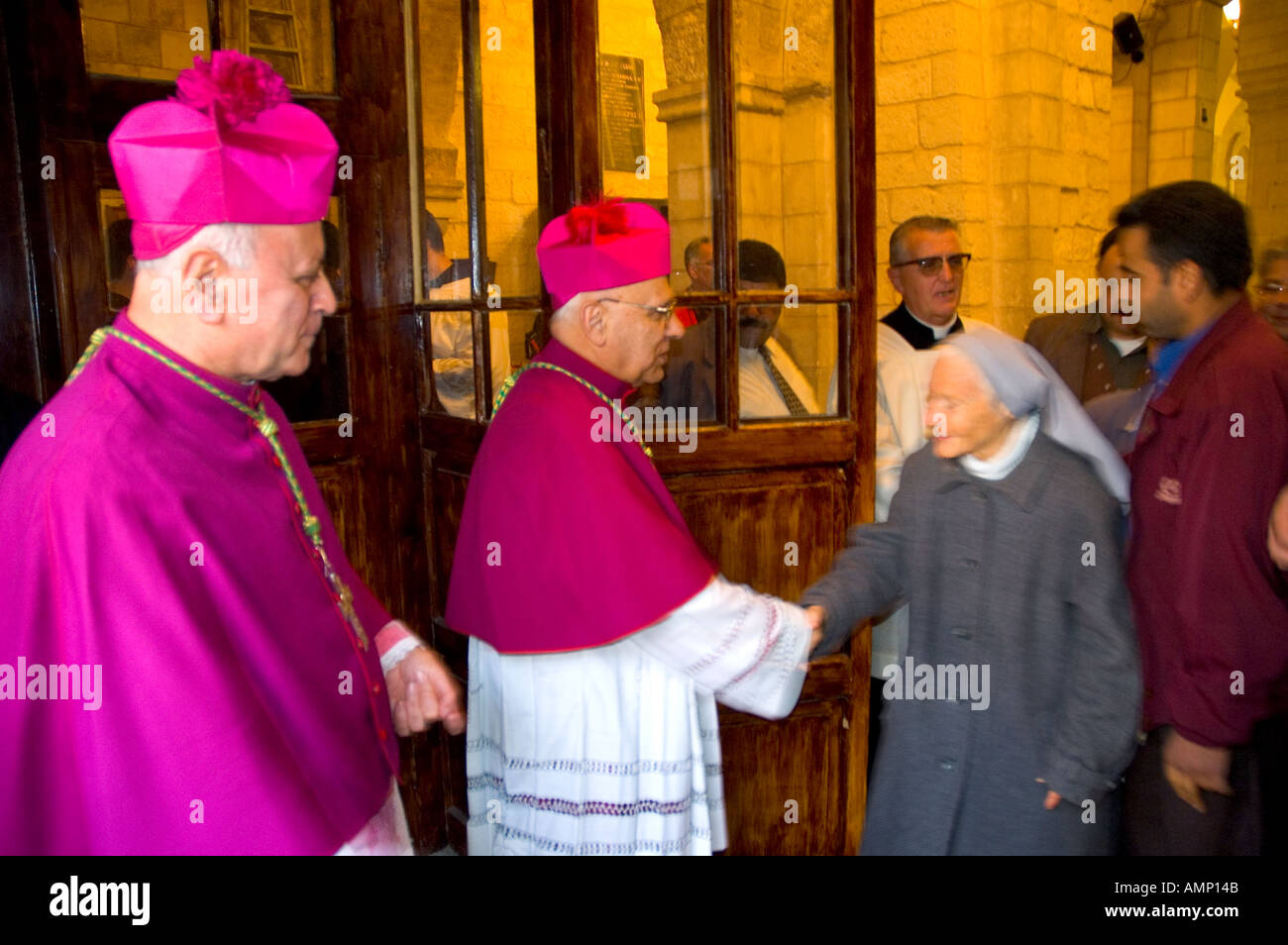 Palestinian Authority Bethlehem church of the Nativity the latin patriarch M Sabah greeting pilgrims after the mass Stock Photo