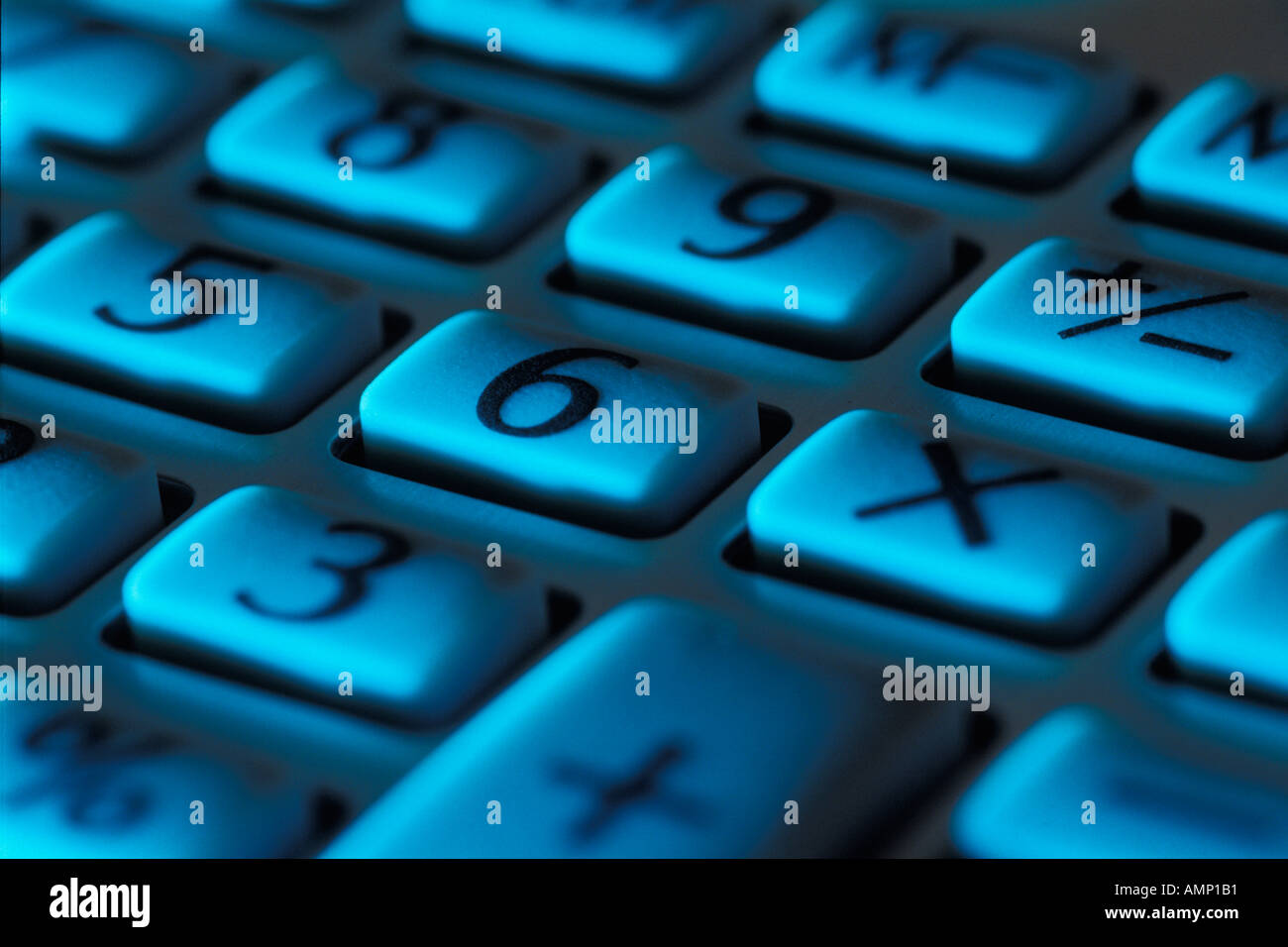 Calculator buttons under blue light Stock Photo