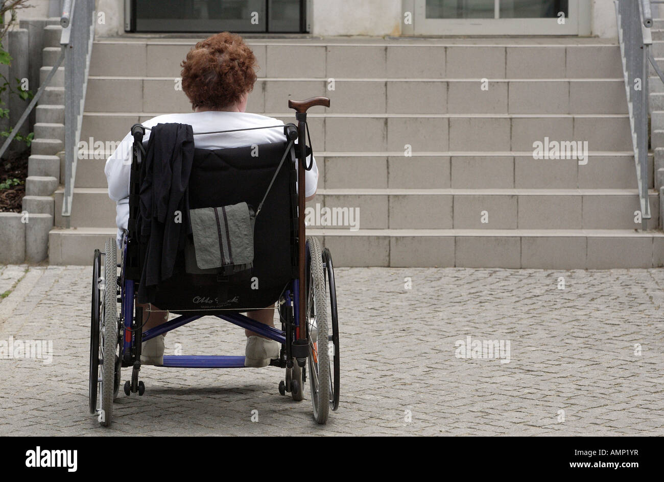 Woman in wheelchair unable stairs hi-res stock photography and images ...