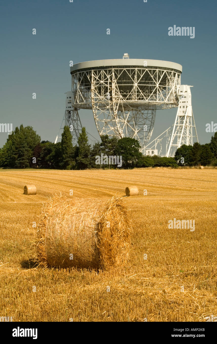 The Giant Mk1A Jodrell Bank Radio Telescope and Round Harvested Hay Bales, Near Holmes Chapel, Cheshire, England, UK Stock Photo
