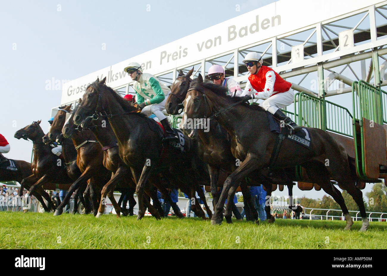 Racehorses Jumping Out Of A Starting Gates Iffezheim Germany Stock Photo Alamy
