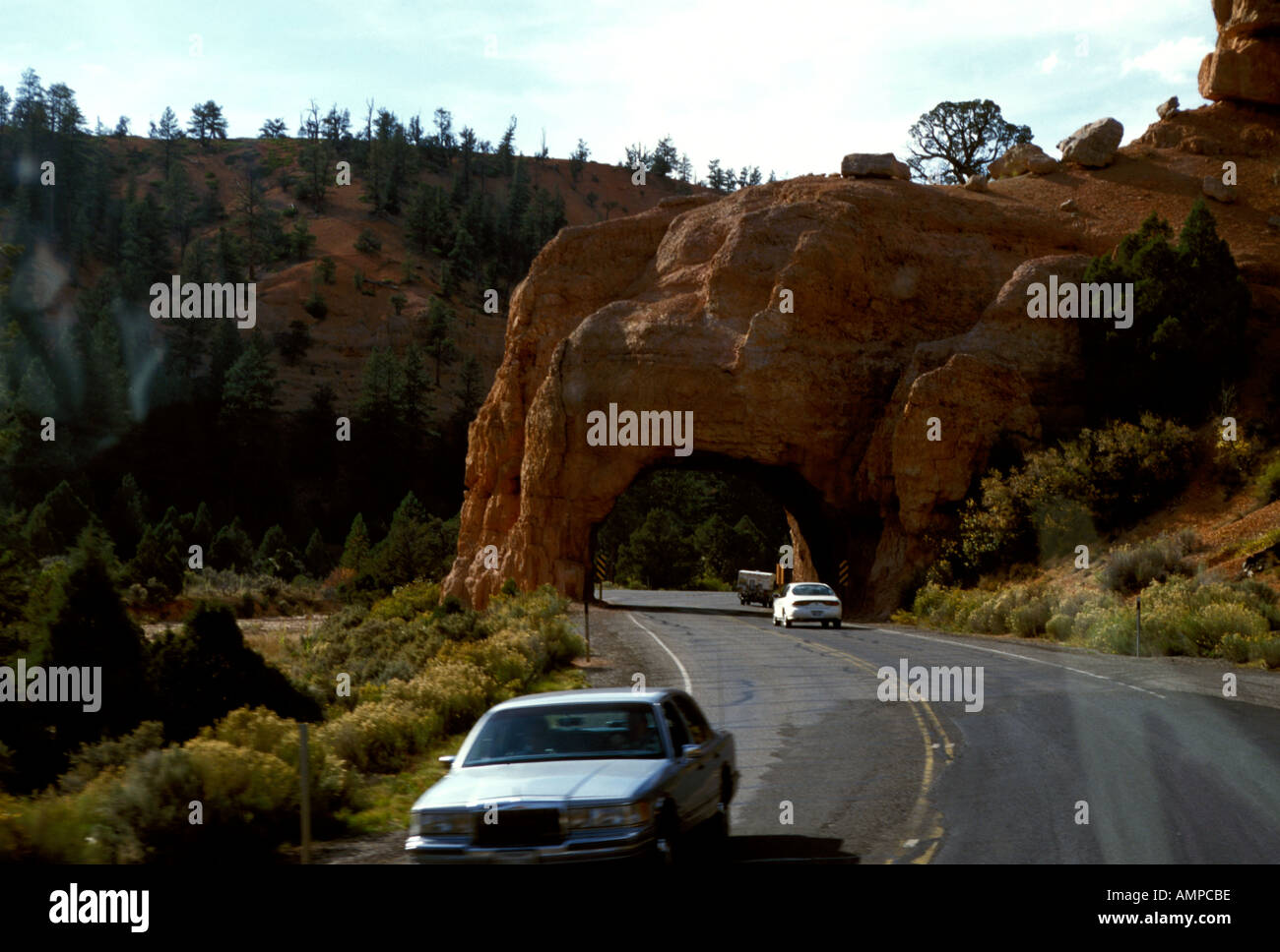 UT Utah Arch or Tunnel seen on highway road from Zion National Park to Bryce Canyon National Park Stock Photo