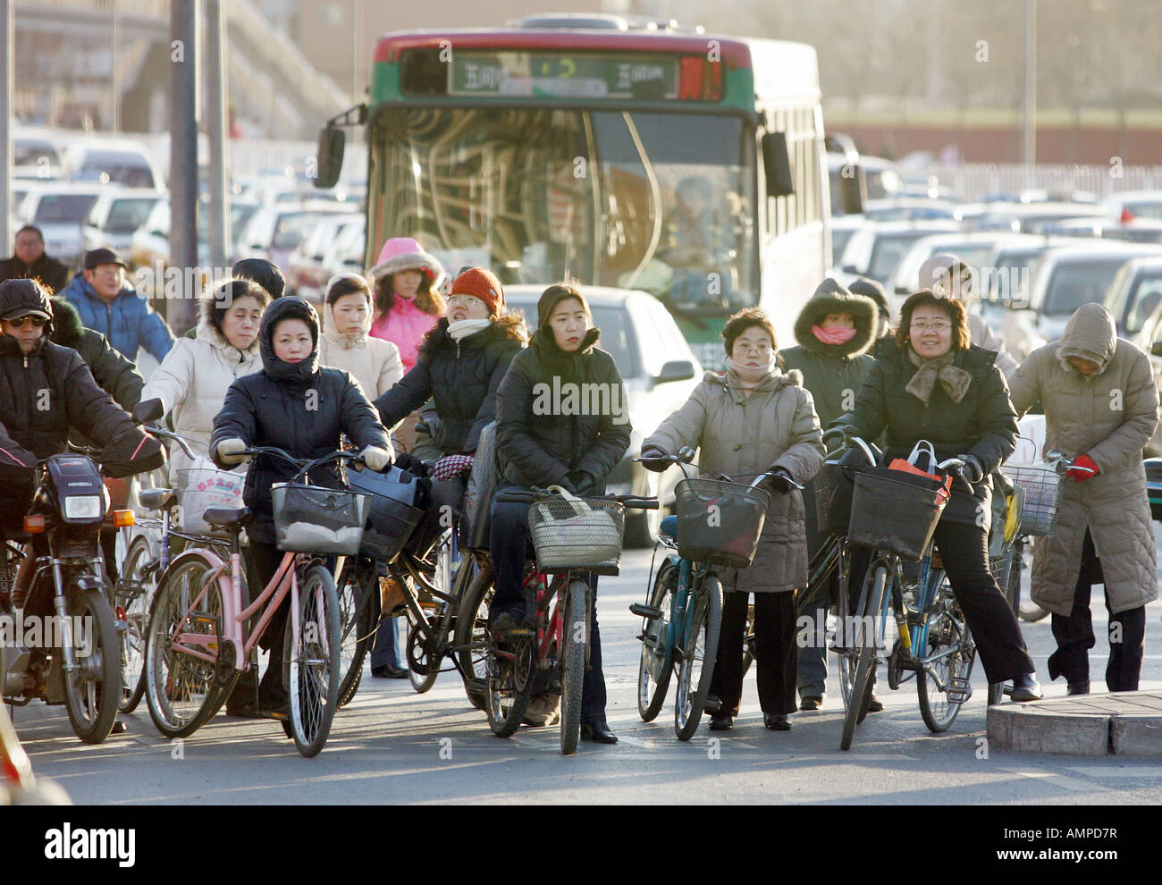 Bicyclists in a street, Beijing, China Stock Photo
