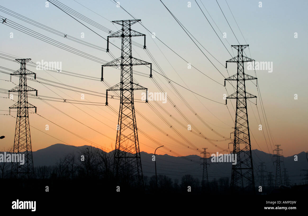 High voltage pylons in the evening, Beijing, China Stock Photo