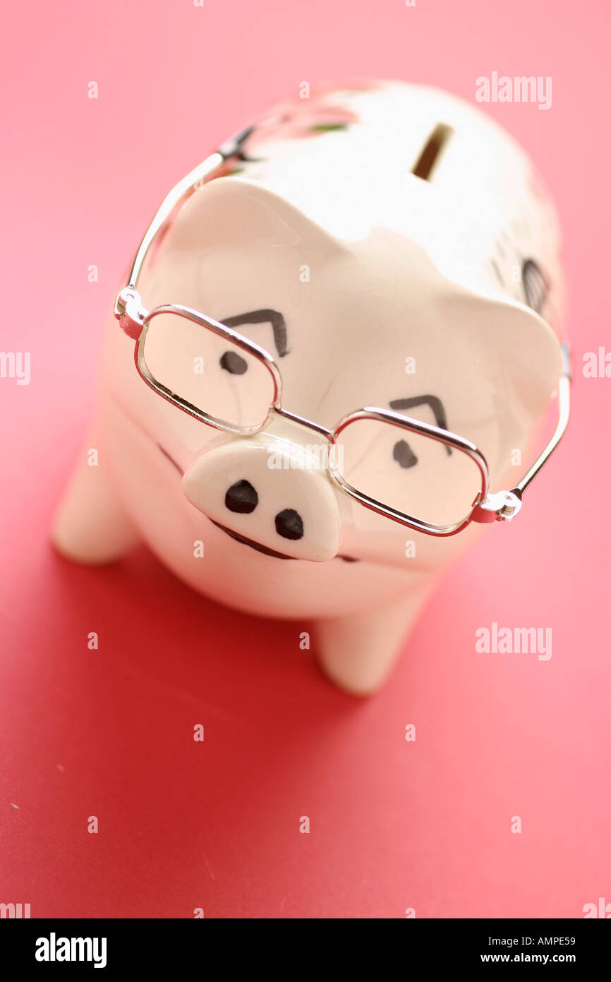 Piggy Bank with Glasses Stock Photo - Alamy