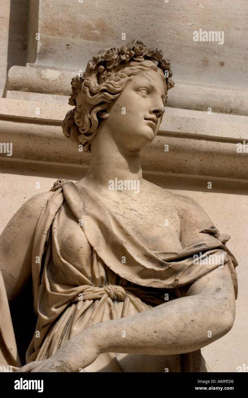 Statue of woman in Louvre Museum Paris France Europe from the Greco Roman period Stock Photo