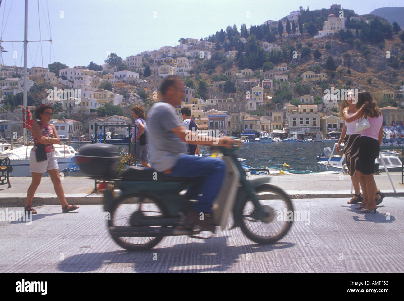 Man riding on moped hi-res stock photography and images - Alamy
