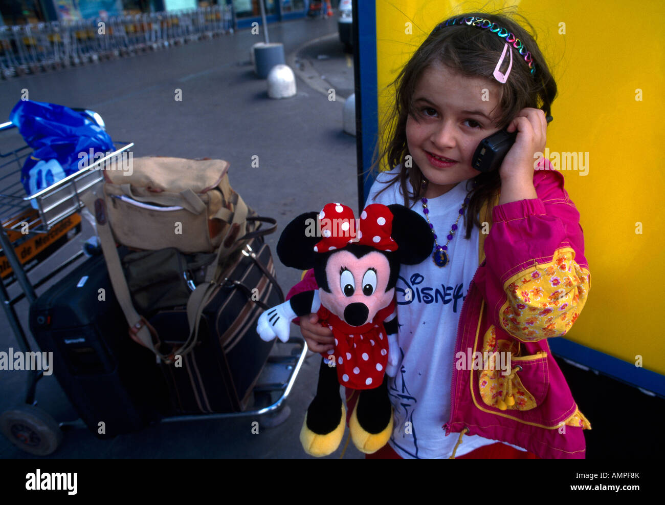 Paris France Orly Airport Child Using Mobile Phone Minnie Mouse Stock Photo