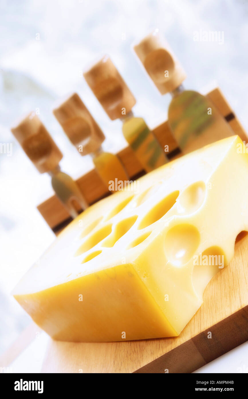 Cheese and cheese knives Stock Photo