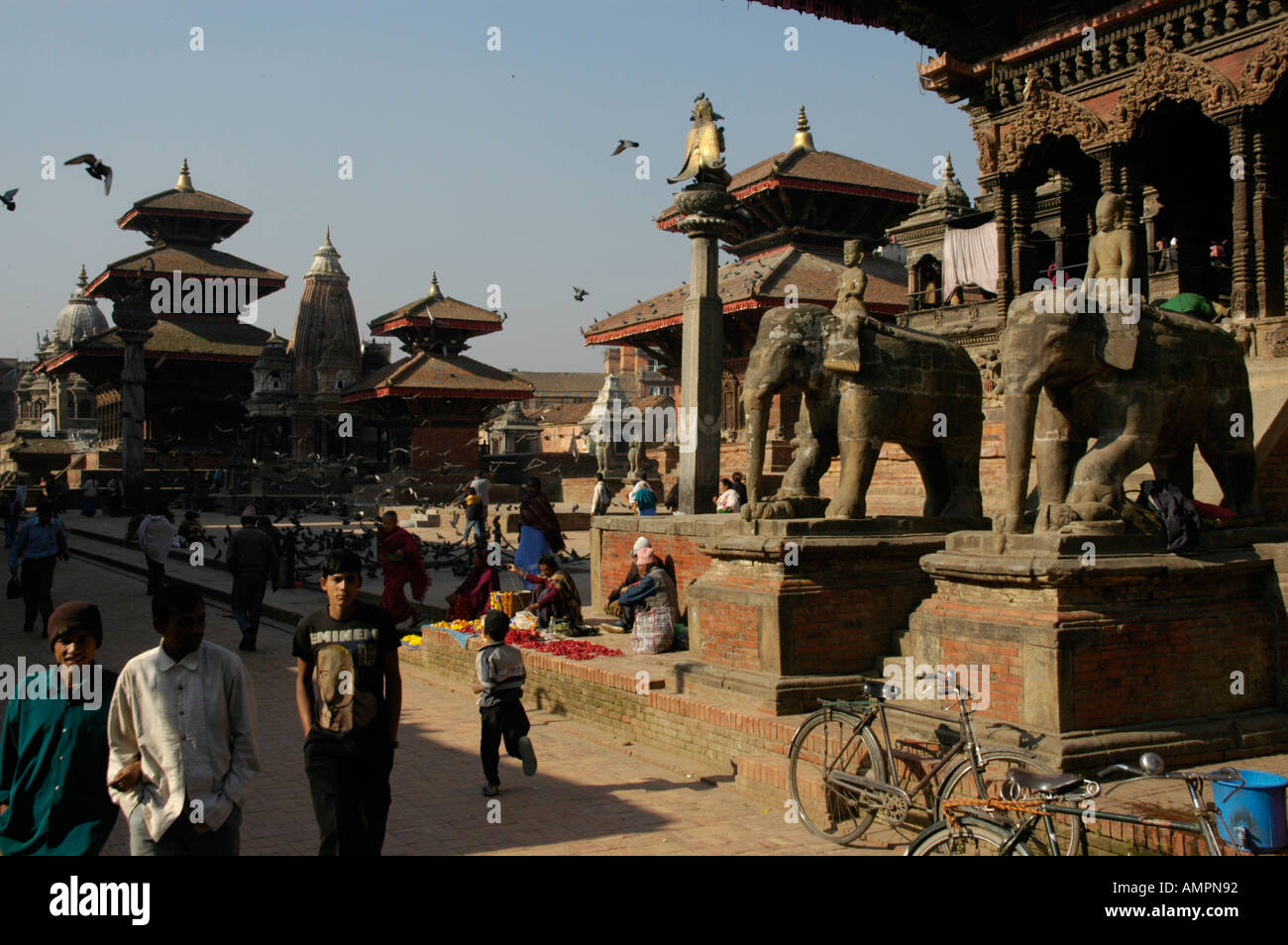 Durbar Square with statues of elephants and many temples Patan Kathmandu Nepal Stock Photo