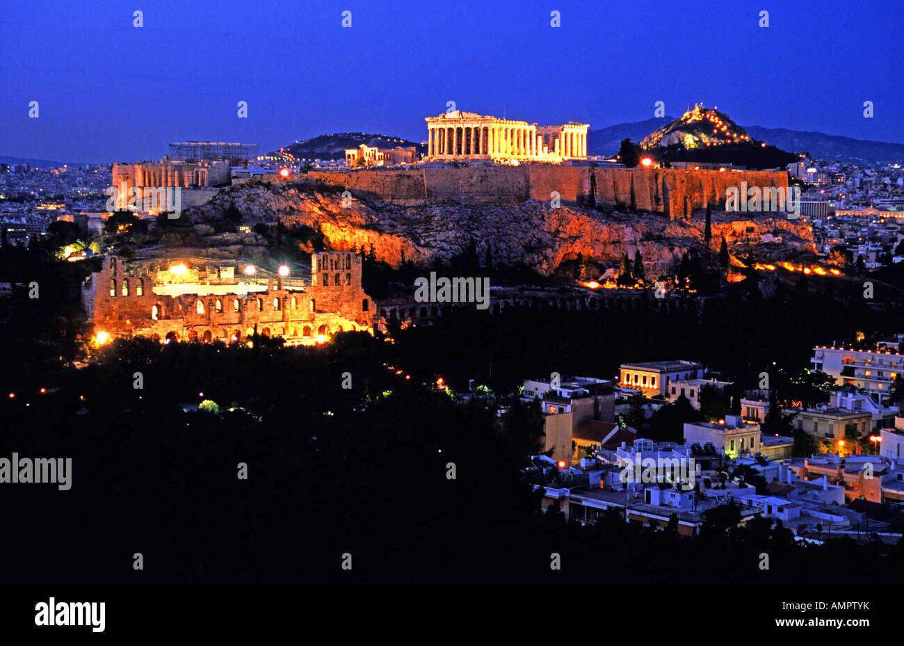 Acropolis with Parthenon atop and Odeon at left in Athens Stock Photo