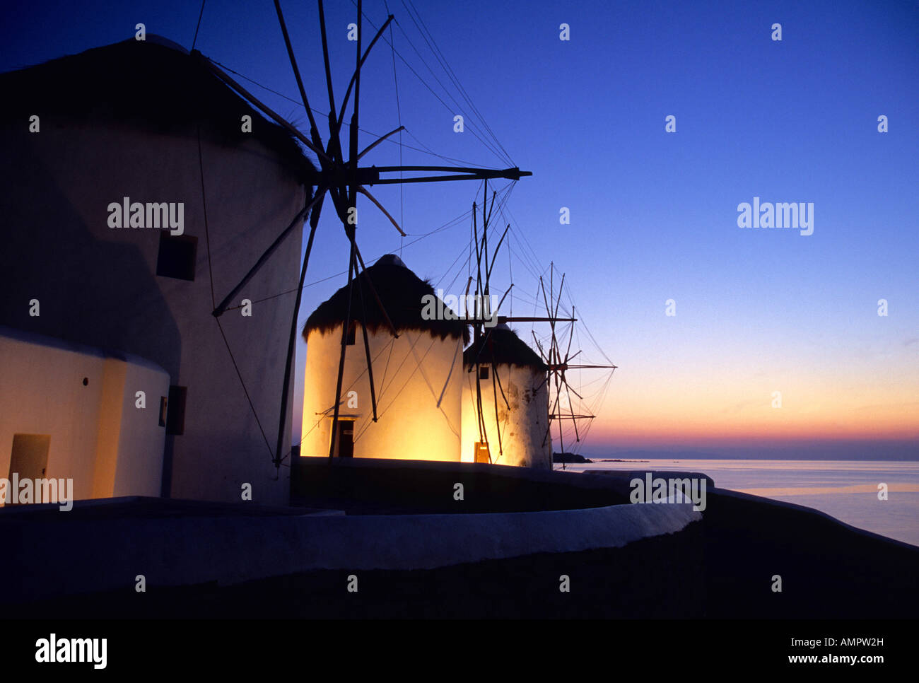 Mykonos windmills at sunset Stock Photo