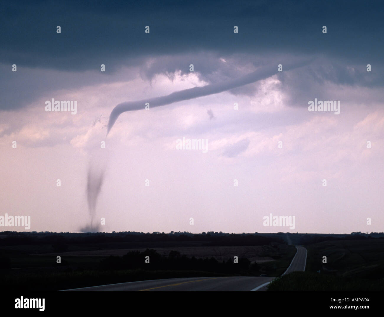 An odd shaped tornado touches down during a tornado outbreak in Nebraska, USA Stock Photo
