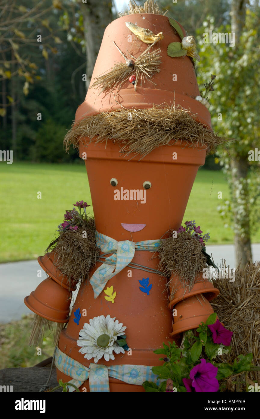 Funny figure made of flowerpots Ayrhof near Viechtach Lower Bavaria Germany Stock Photo