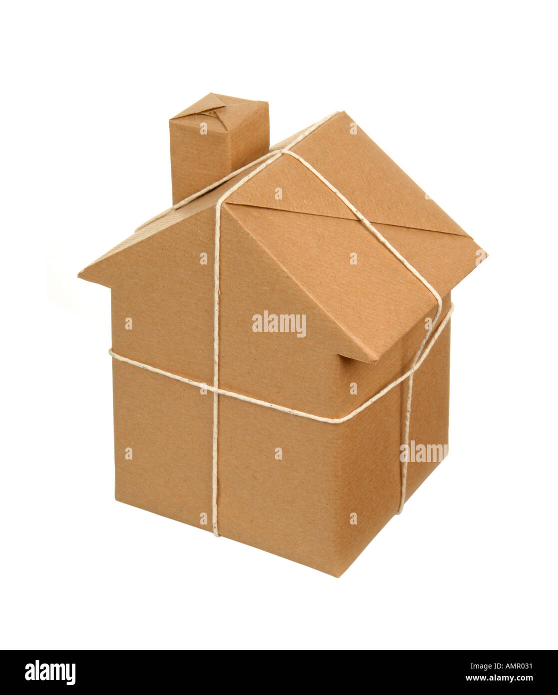 Model house wrapped in brown wrapping paper and string Stock Photo Alamy