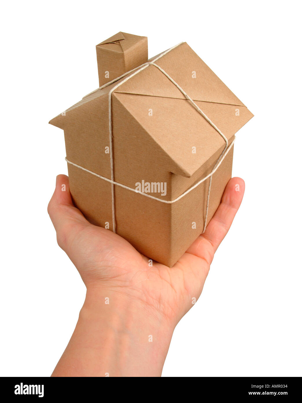 Model house wrapped in brown wrapping paper and string Stock Photo Alamy