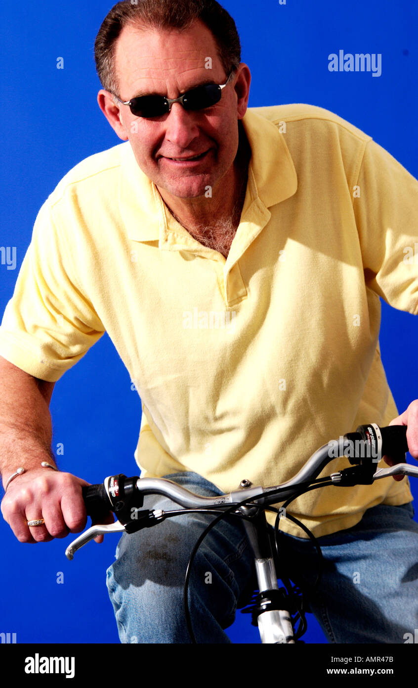 Man riding a bicycle Stock Photo