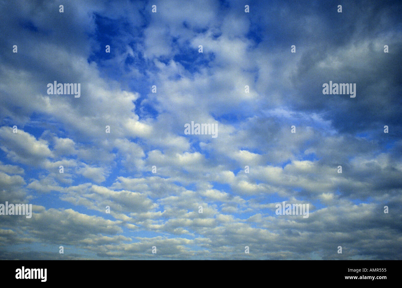 altocumulus cloud formation daytime Stock Photo