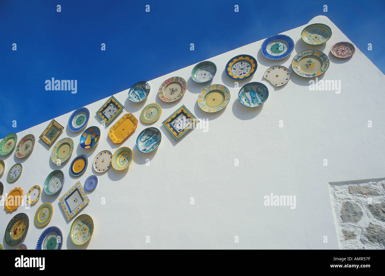 Traditional portuguese decorated pottery plates outside artisan