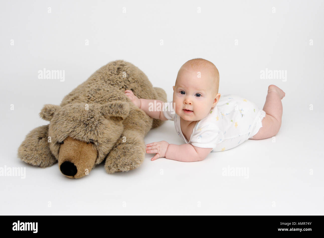 Baby with Teddy Bear 2007 Stock Photo - Alamy