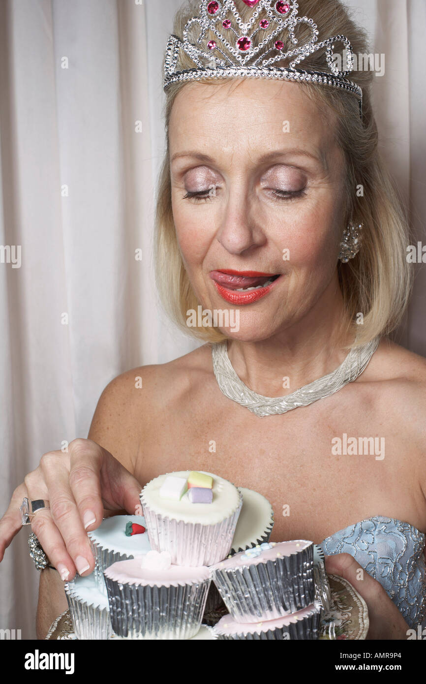 Woman Holding Cupcakes Stock Photo
