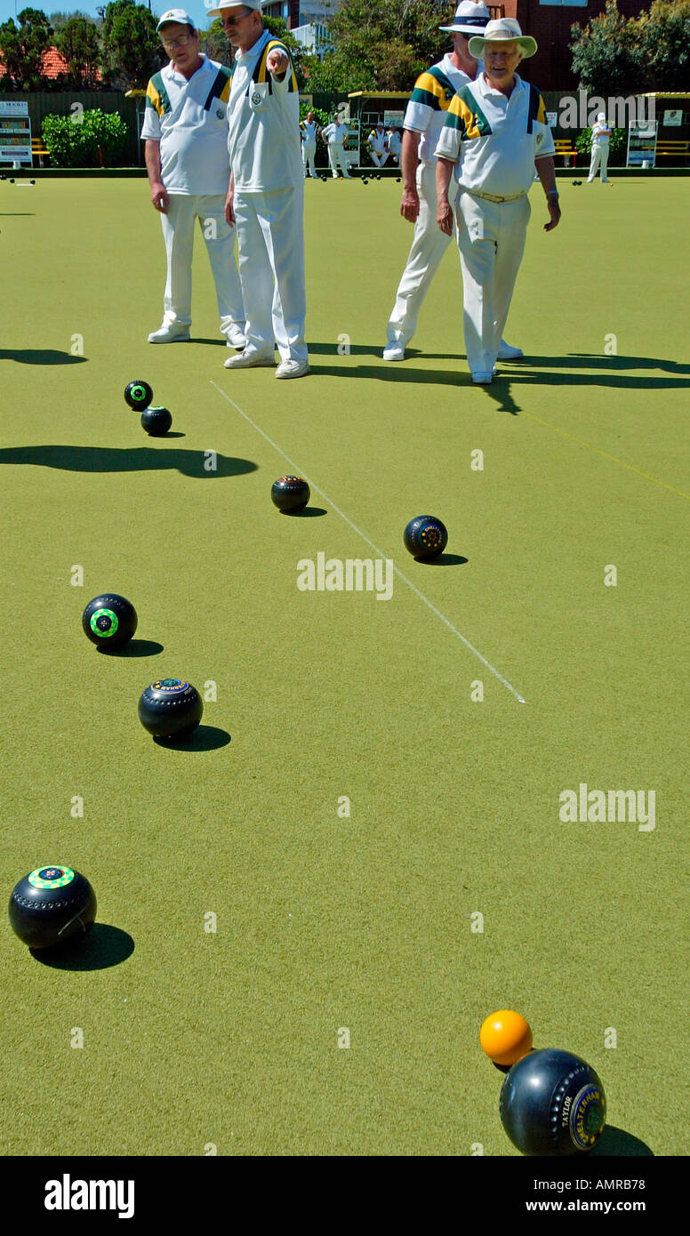Checking position of balls during lawn bowls competition at club in Melbourne Australia Stock Photo