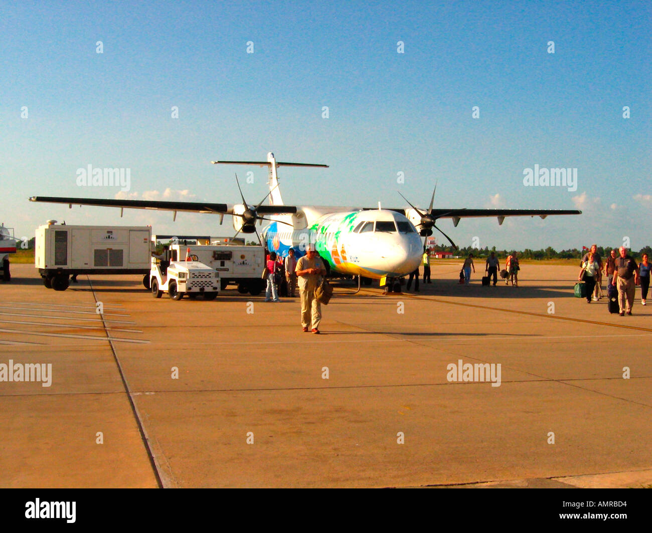 Passengers disembark Siem Reap Airways ATR 72 Siem Reap Airport Cambodia Stock Photo