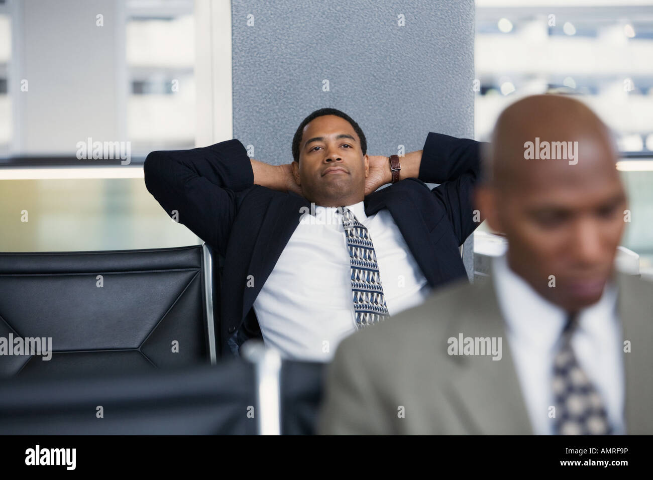 African businessmen in waiting area Stock Photo