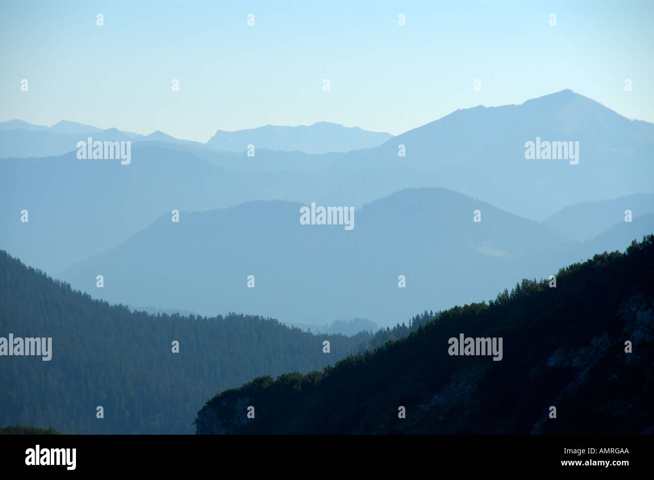 Misty mountain slopes mountain landscape Estergebirge Bavarian Alps Upper Bavaria Germany Stock Photo